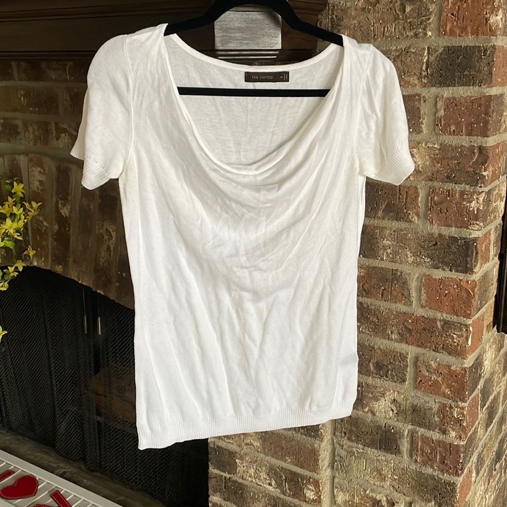 The limited white shirt sleeved sweater top